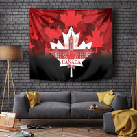 Red and black Canada Day tapestry featuring scattered maple leaf silhouettes and emblem