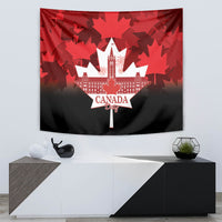 Red and black Canada Day tapestry with maple leaf pattern and central Canada Day emblem