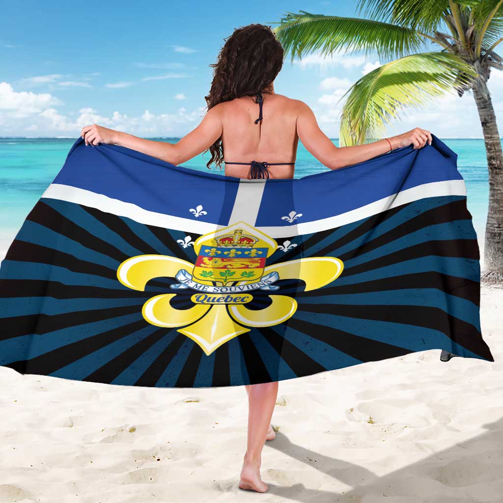 Blue Quebec sarong wrap with central crest, fleur-de-lis, and navy/teal stripes