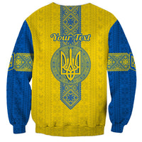 Unisex crewneck sweatshirt, gold and blue folk pattern, back trident circle with 'Your Text'