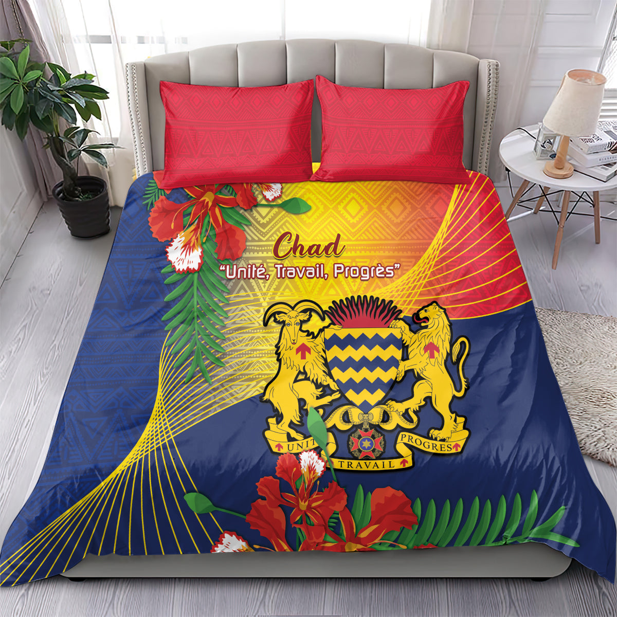 Blue printed bedding set with lions crest, flowers, and red trim, plus two pillowcases