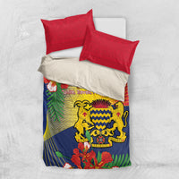 Blue independence-themed bedding set with crest on duvet and red decorative pillows