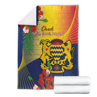 Folded blue Chad blanket with lion crest, palm leaves, and colorful border