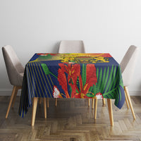 Blue tablecloth with vibrant tropical flowers and stripes, on dining table