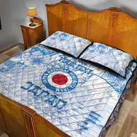 Blue and white quilt bed set with two pillows, circular Japan football emblem centerpiece