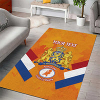 Orange rugby area rug with Netherlands flag blocks, lion crest, and 'YOUR TEXT'