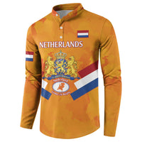 Orange Netherlands rugby button sweatshirt front with NETHERLANDS wordmark and crest