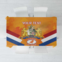 Orange tablecloth with central crest, blue-red-white stripe design, and custom text area