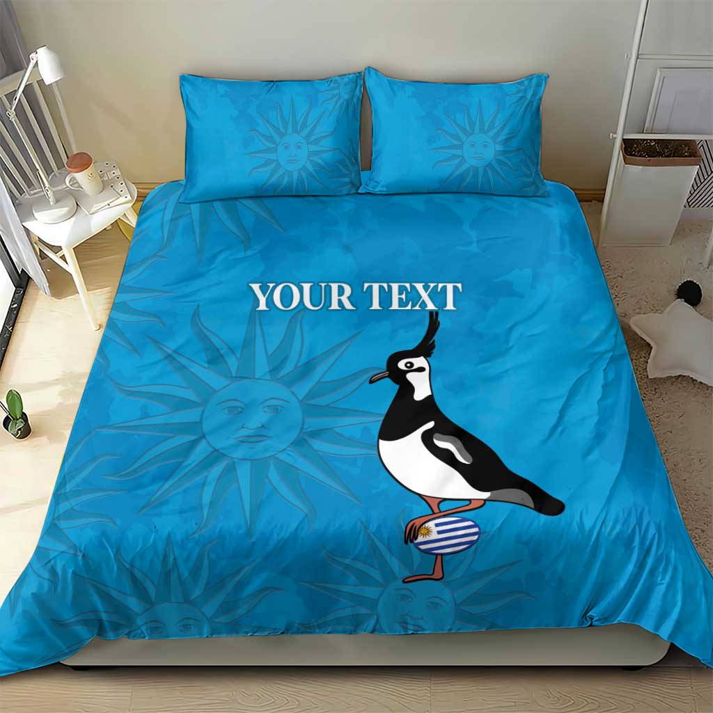 Blue duvet cover bedding set with two pillowcases, sun pattern and penguin illustration
