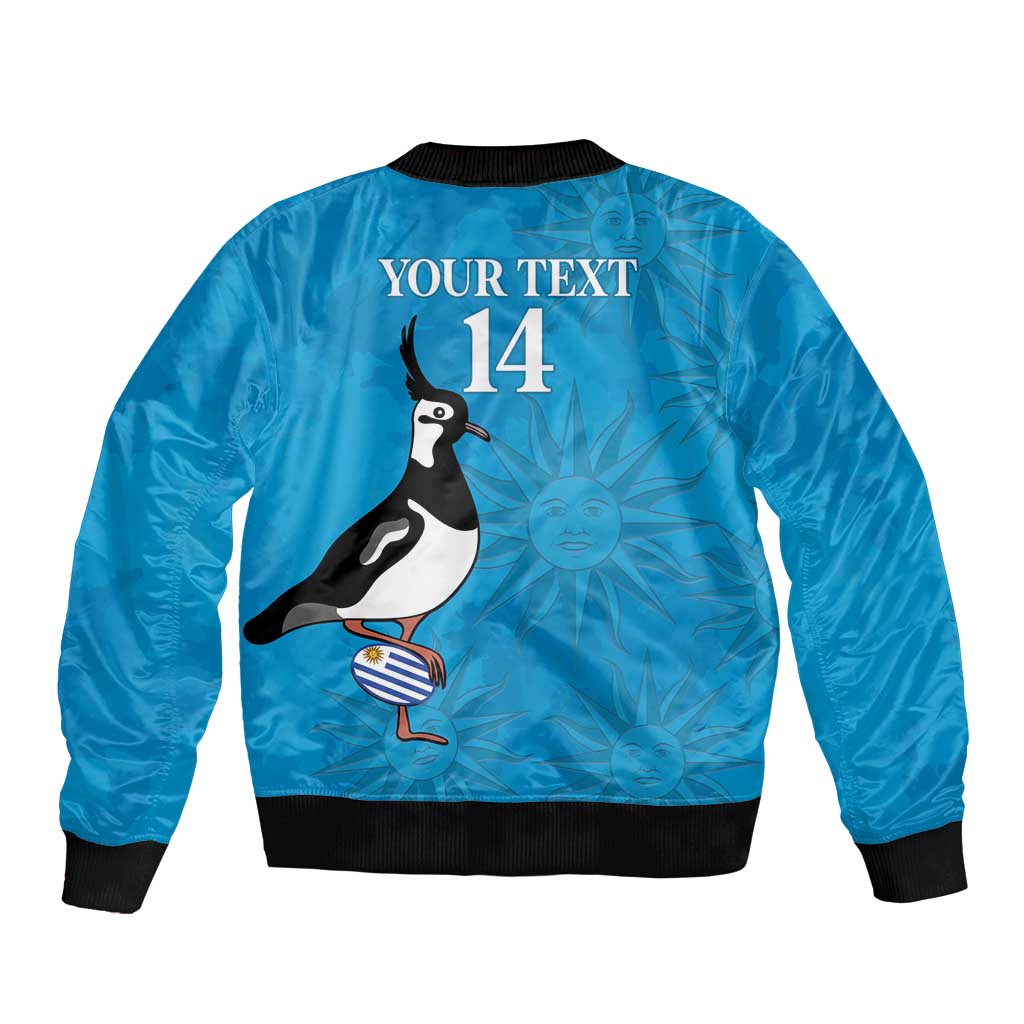 Unisex blue bomber jacket with black ribbed trim, full-zip front, penguin graphic