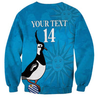 Blue crewneck rugby sweatshirt with back text "YOUR TEXT" and number 14, penguin graphic