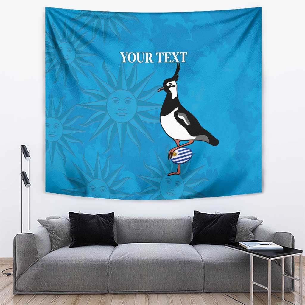 Blue tapestry with penguin holding striped ball and sunburst pattern