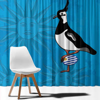 Blue curtain panel close-up with bird graphic and 'YOUR TEXT' text