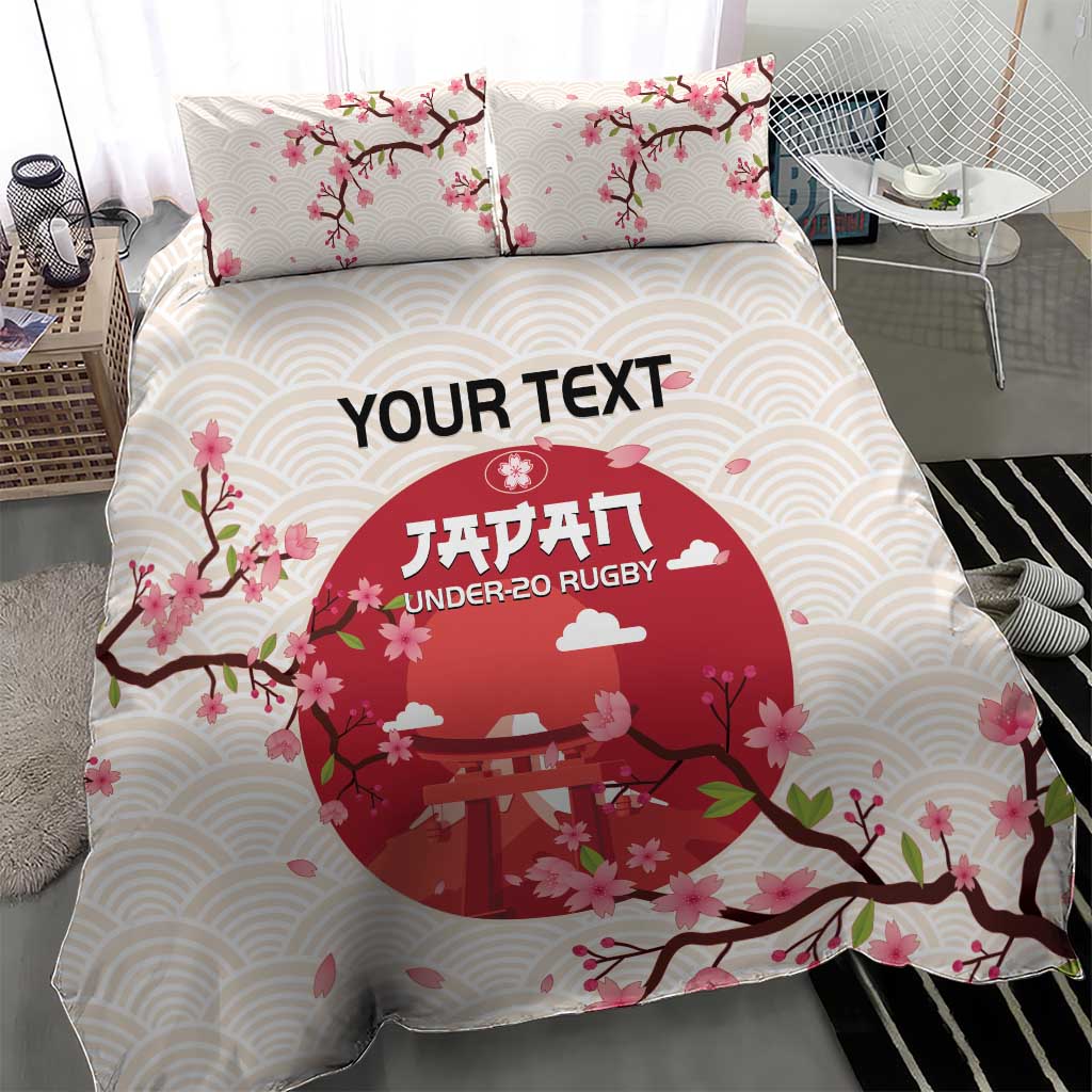 White duvet cover and two pillowcases with pink flowers, wave pattern, and red rugby logo