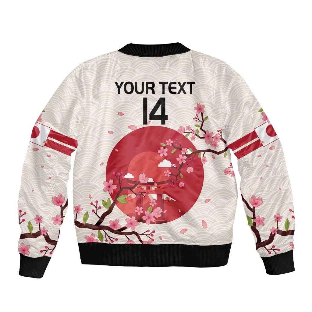 White bomber jacket back with red circle cherry blossom print, black ribbed hem and cuffs