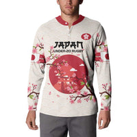 White rugby button sweatshirt with red collar, cherry blossom print, torii graphic