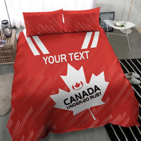 Red Canada rugby duvet with maple leaf logo and 'YOUR TEXT' on bed