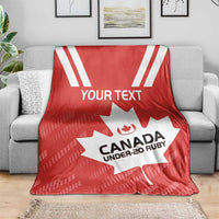 Red Canada Under-20 Rugby blanket on light gray couch with maple leaf and your text