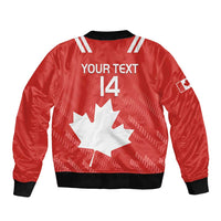 Red rugby bomber jacket back with white maple leaf, "YOUR TEXT 14", black trim
