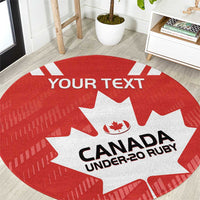 Red round rugby carpet with white maple leaf and bold “CANADA UNDER-20 RUGBY” text