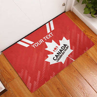 Red rugby rubber doormat with Canada Under-20 Rugby text and maple leaf center