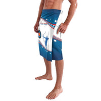 Blue and white archery graphic wrap-style shorts with elastic waistband, side view
