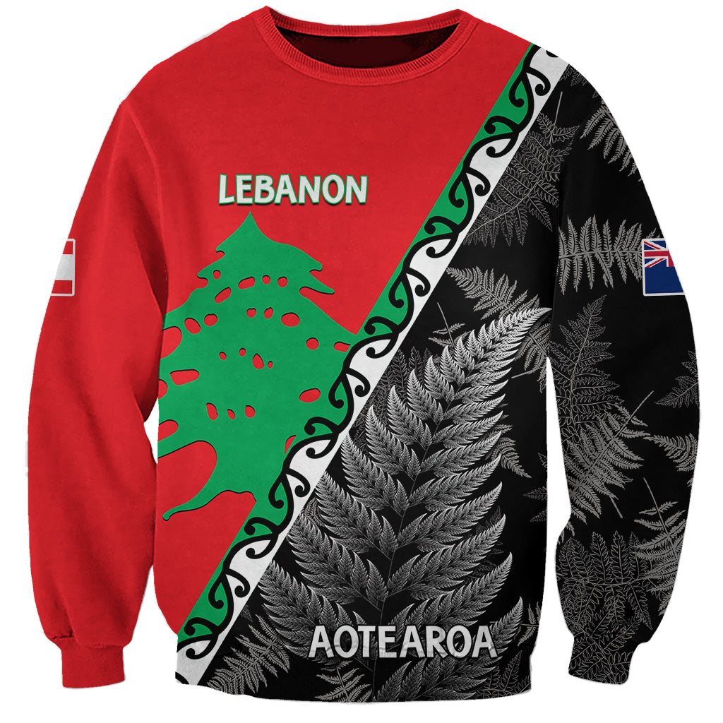 Unisex red sweatshirt with diagonal graphic band, “LEBANON” and black feather fern