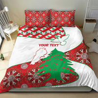 Personalised bedding set with red patterned pillowcases and white duvet featuring Lebanon map and cedar tree