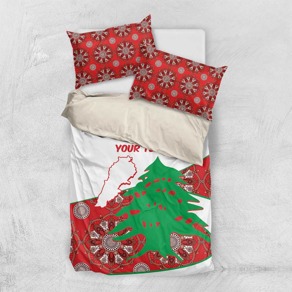 Personalised bedding set flat lay: white duvet with Lebanon outline, cedar tree, and red patterned details