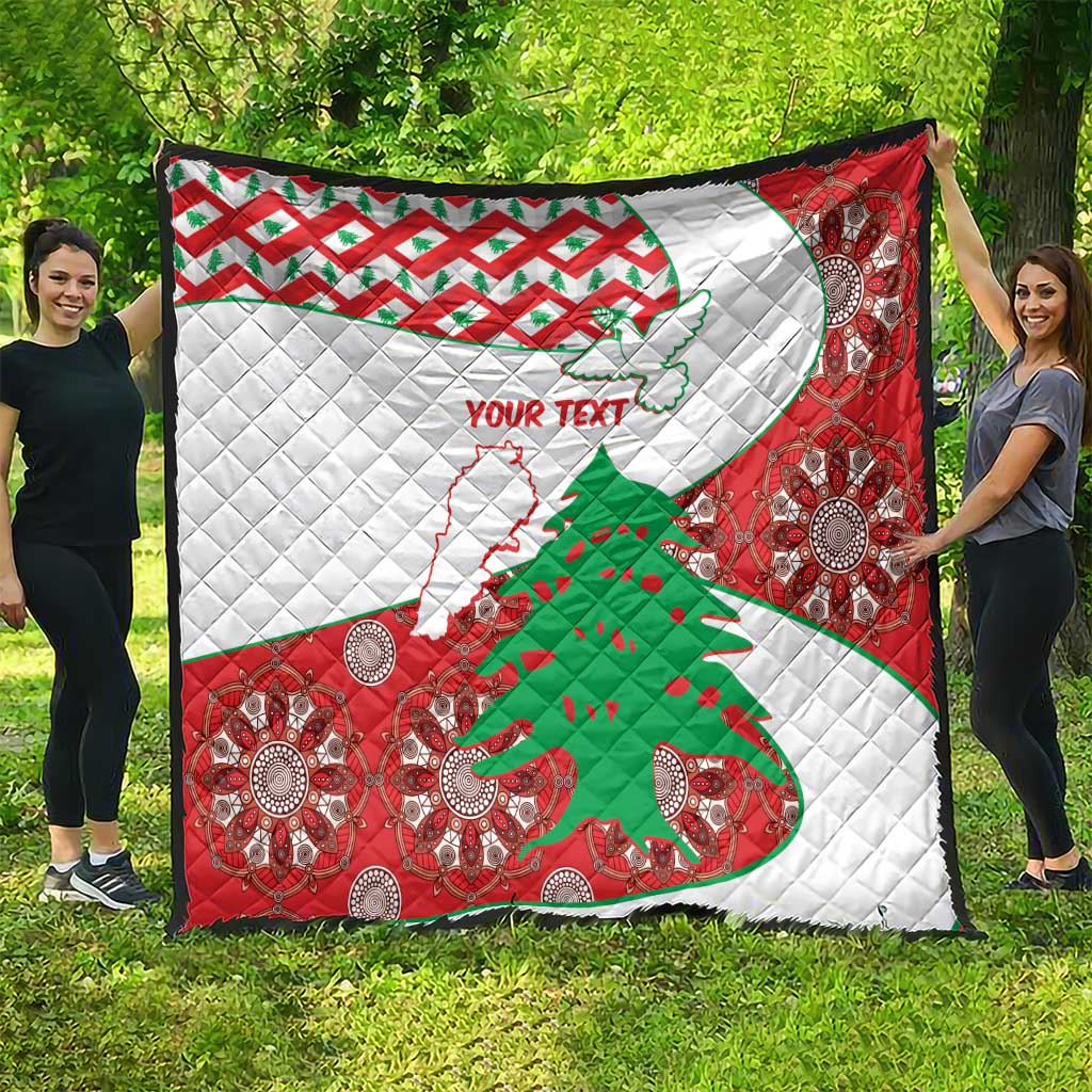 Red and white quilt laid outdoors, featuring Lebanon map, tree, and decorative medallions