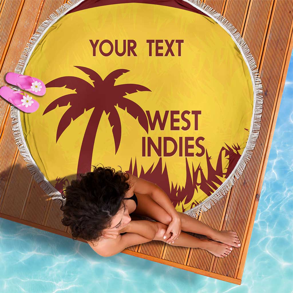 Gold round beach blanket with white fringe, West Indies logo and “YOUR TEXT”