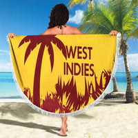 Gold round beach blanket with white fringe, West Indies palm design held on beach