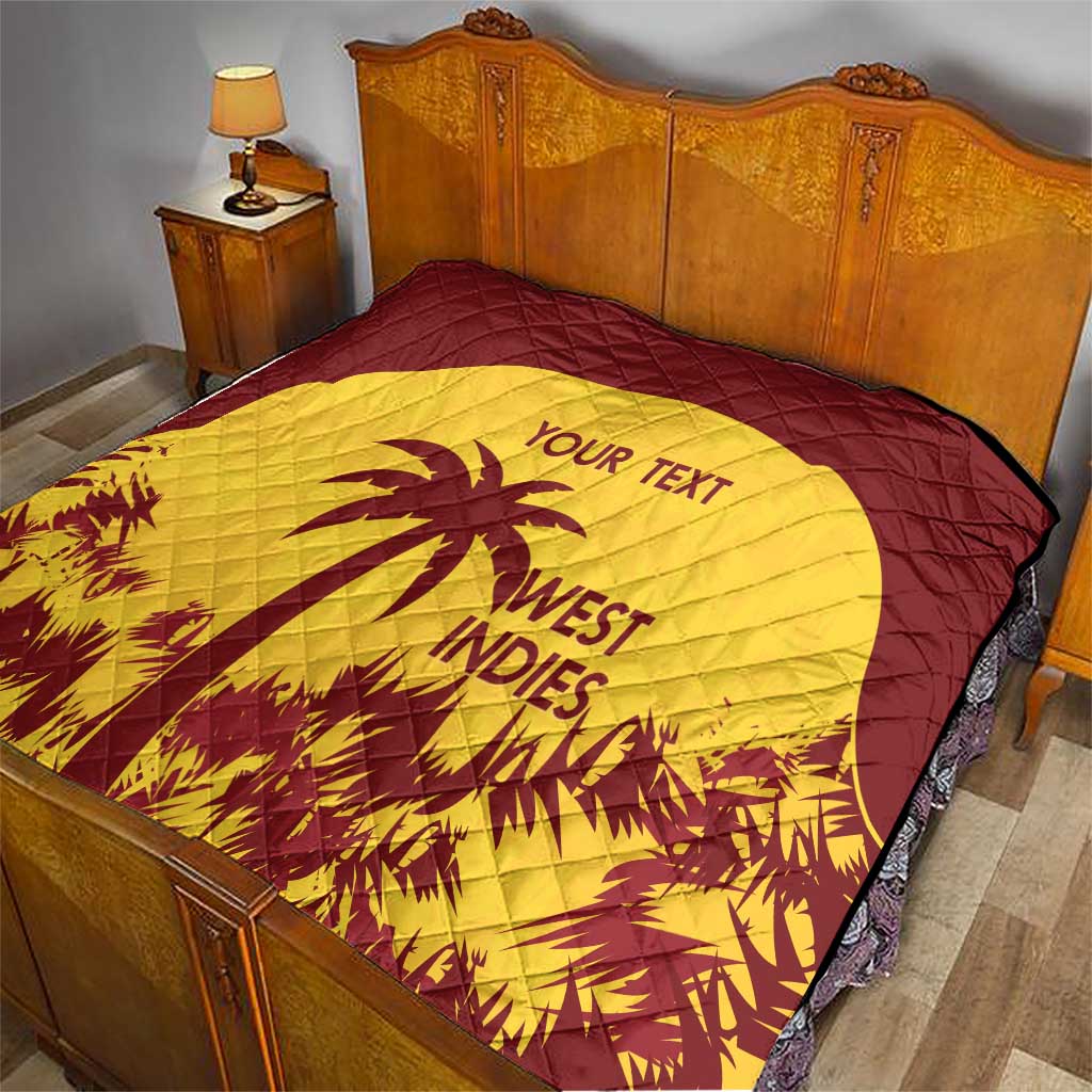 Quilt on bed with maroon border and yellow center, palm tree graphic and “YOUR TEXT”
