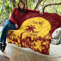 Person holding maroon and yellow quilt showing palm tree graphic, “WEST INDIES” and “YOUR TEXT”