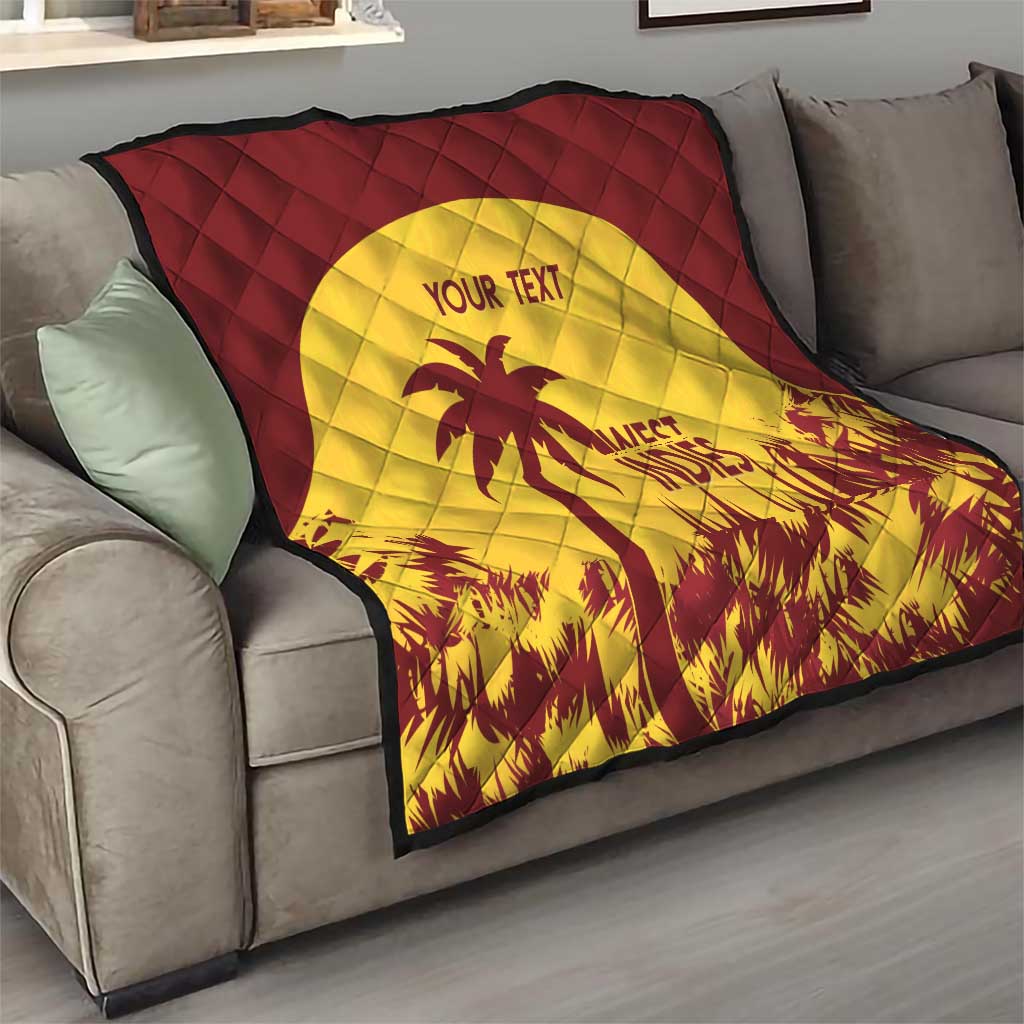 Maroon and yellow quilt draped on sofa, palm tree emblem with “WEST INDIES” and “YOUR TEXT”