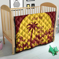 Quilt on toddler bed with maroon border, yellow palm tree graphic, “WEST INDIES” and “YOUR TEXT”