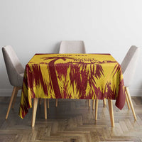 Gold and maroon patterned tablecloth with palm-leaf motif