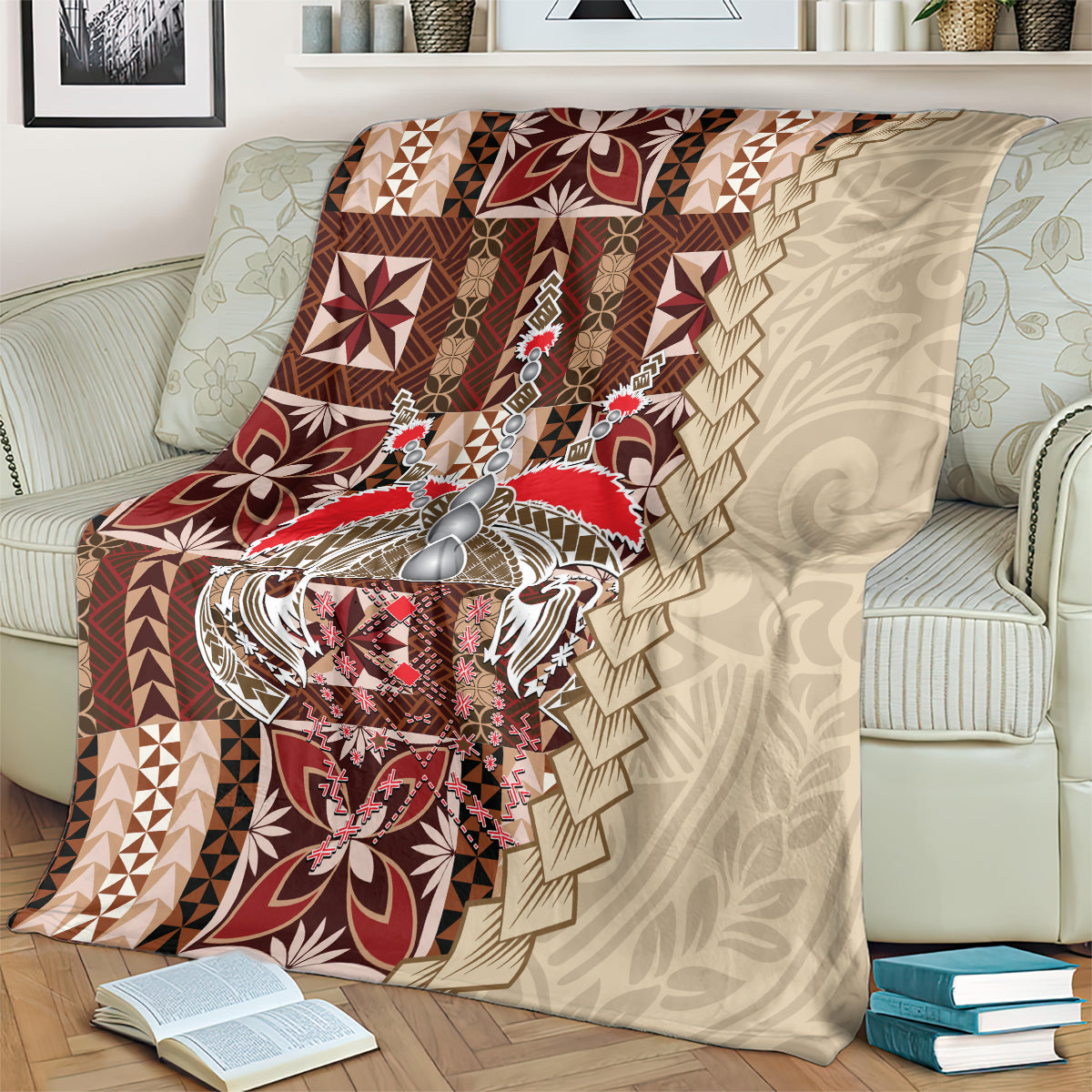 Samoan tapau siapo-pattern blanket with layered zigzag border and ornate central face design