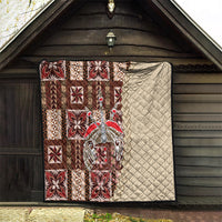 Patchwork quilt with brown and red patterned blocks; cream quilted panel on the right.