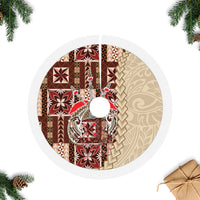 Fringed circular tree skirt with brown, red, and cream Siapo-style panels
