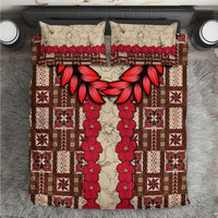 Brown tapa-pattern bedding set with red floral and geometric trim; includes two pillowcases