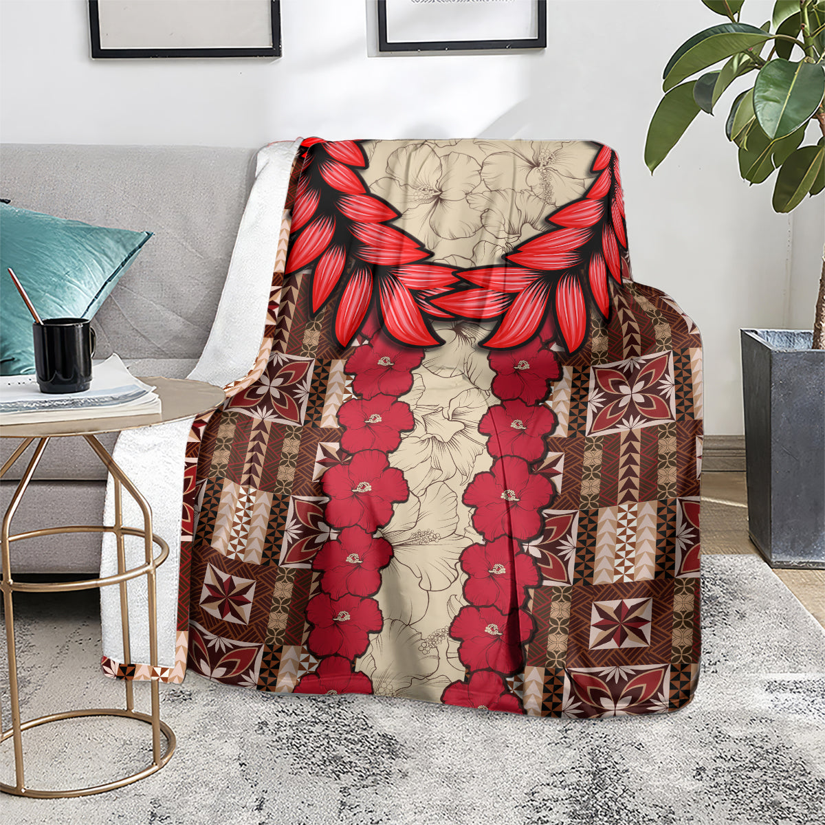 Samoa siapo blanket on living room couch, red floral vine design with brown geometric patchwork