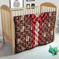 Brown crib quilt with red leaf wreath and red floral stripe, cream geometric quilted pattern
