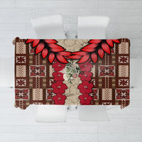 Brown tablecloth with red tapa floral and geometric block pattern