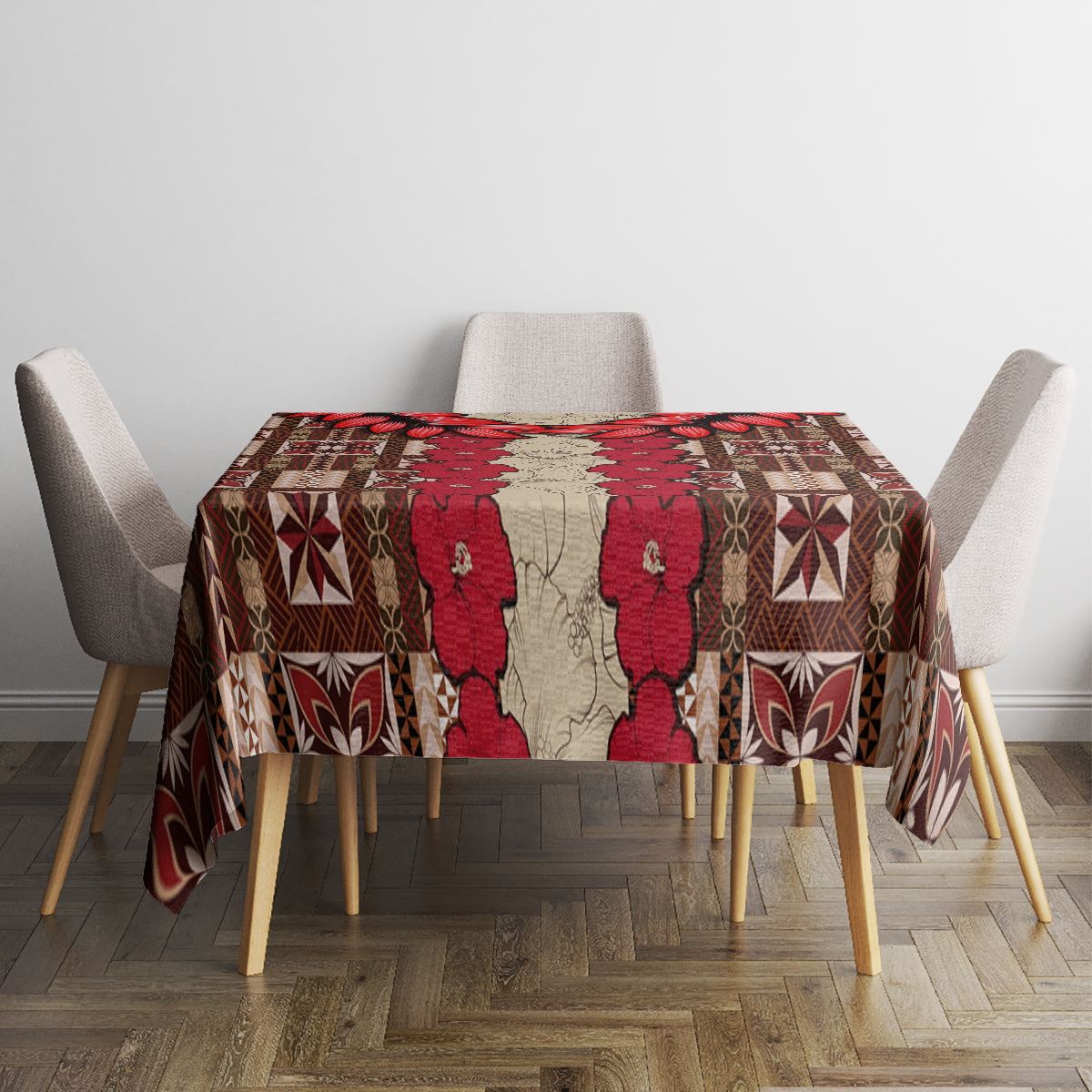 Tablecloth on square dining table with red tapa floral and geometric motifs