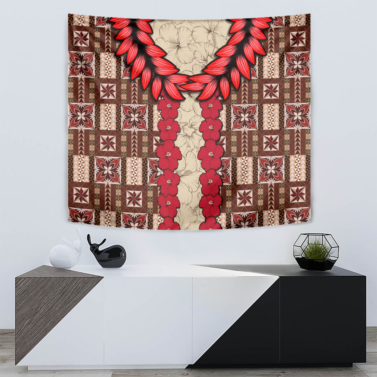 Brown and red tapa-style tapestry with central vertical garland and geometric border blocks