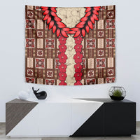 Brown and red tapa-style tapestry with central vertical garland and geometric border blocks
