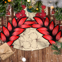 Brown tapa tree skirt with large red hibiscus blooms and cream tapa center