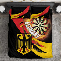 Black duvet cover with red, yellow, and green dartboard and flaming flame graphics