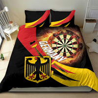 Black duvet cover and pillowcases with dartboard, sword, shield, and red-yellow graphics
